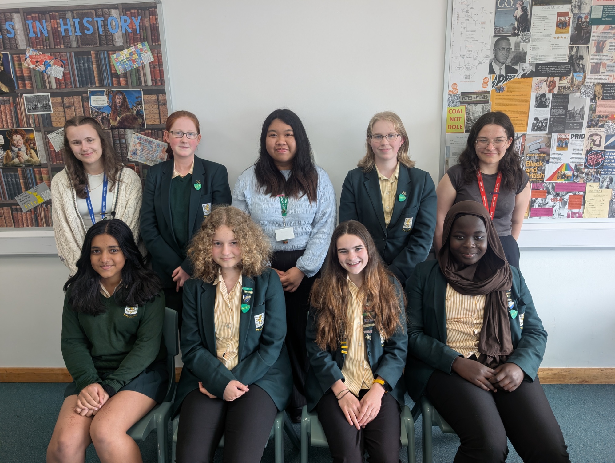 Ribston Heritage Champions sitting and standing together in one of our History classrooms.