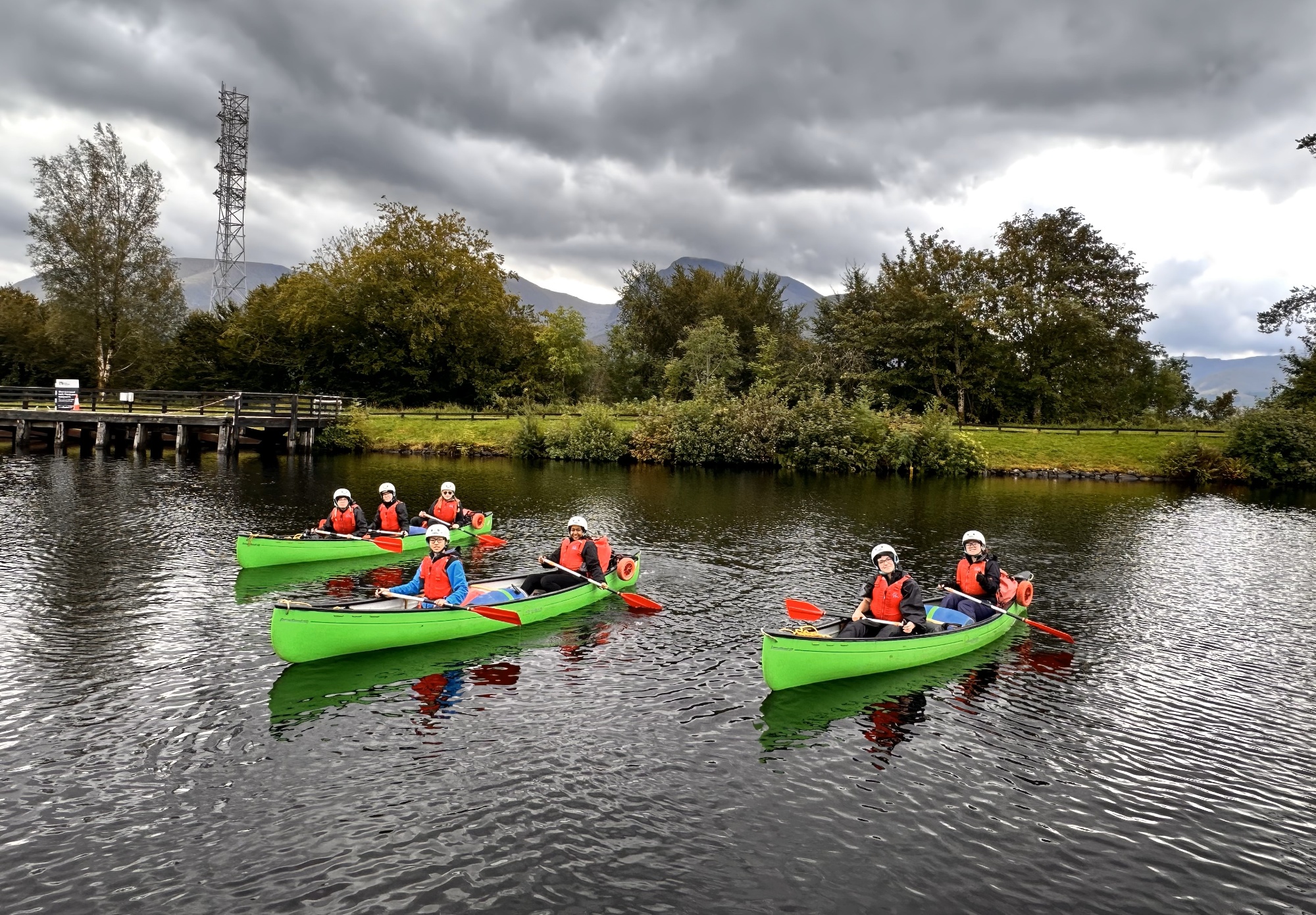 Four students in kayak during Duke of Edinburgh expedition